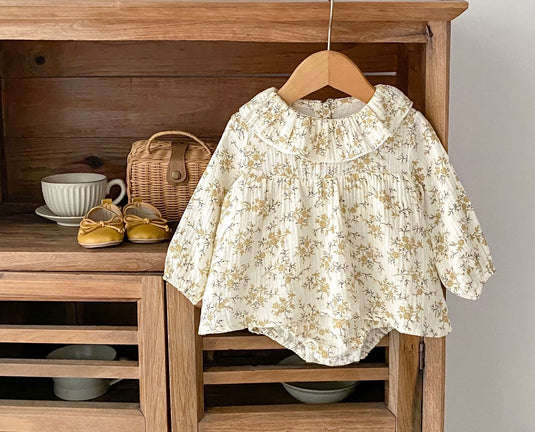 Soft cotton baby girl romper with yellow flowers